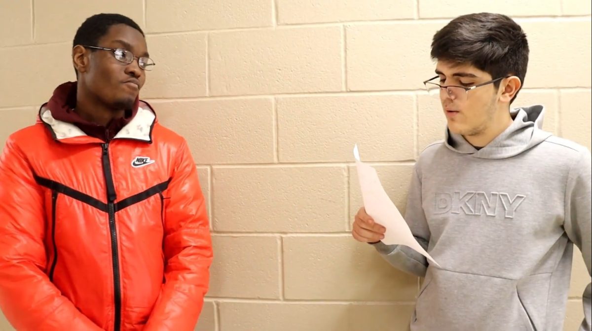 Dimitrios Maras, Assistant Fielder Friday Editor, quizzes Jordan Walton, senior, on Christmas trivia.