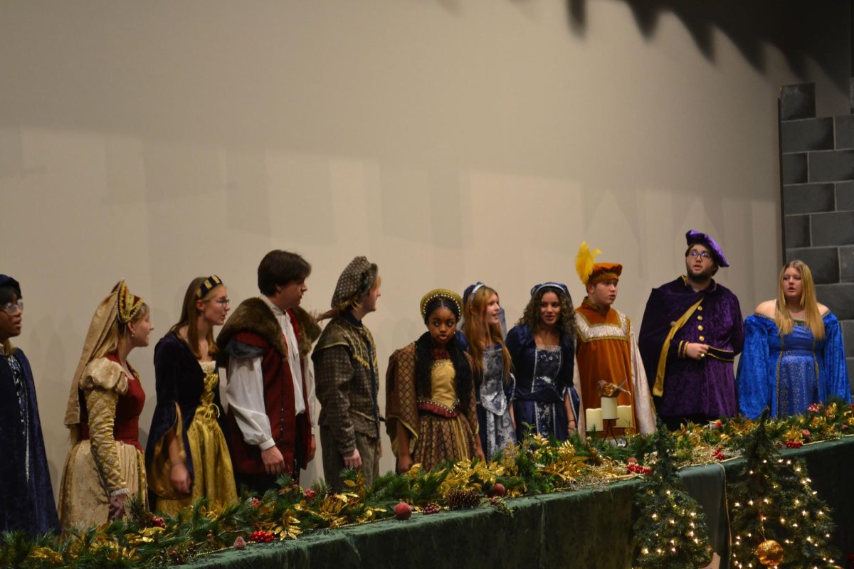 The Madrigals harmonize together, singing Christmas songs from the Renaissance period.